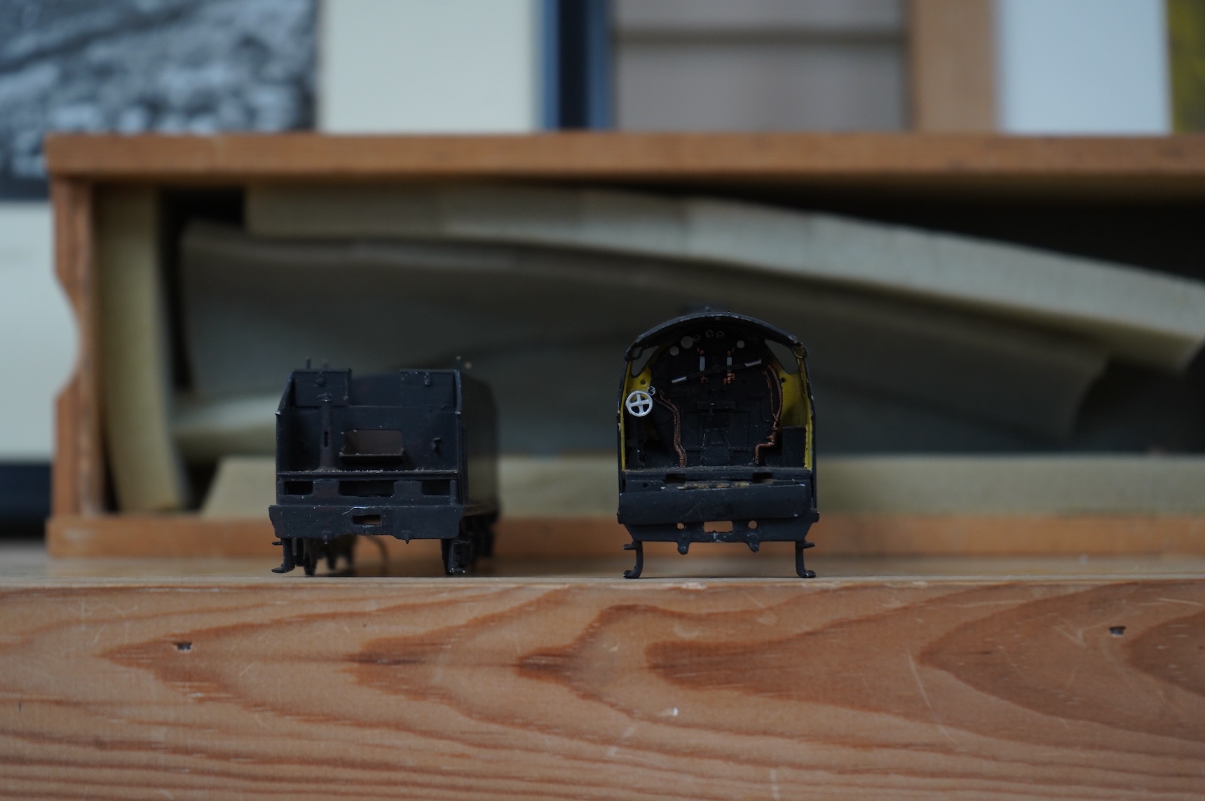 Two kit built and adapted EM gauge LMS railway locomotives; an 0-8-0, 9518, and an 0-6-0 class 4F based on an Airfix kit, together with the body only of an SR Schools Class